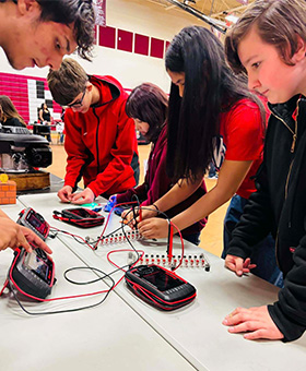 Students working with electronics