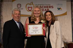 Amanda Howard receiving teacher of the year award