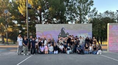 Students in front of chalk mural
