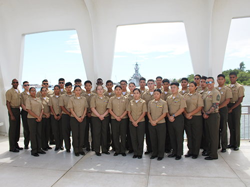JROTC Cadets and Instructors pause for a photo while touring the USS Arizona Memorial