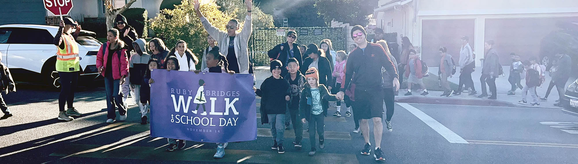 Students and adults participating in a Ruby Bridges Walk to School Day