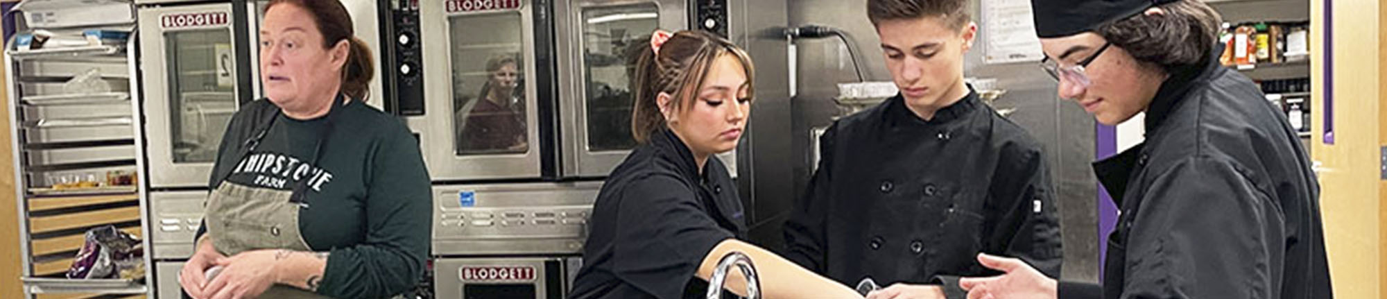 CTE Students in the kitchen preparing food