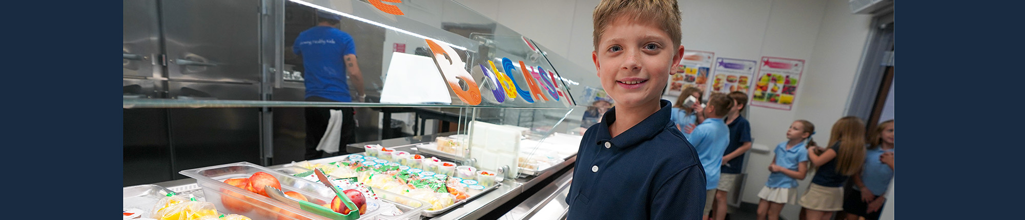 Happy student in the cafeteria