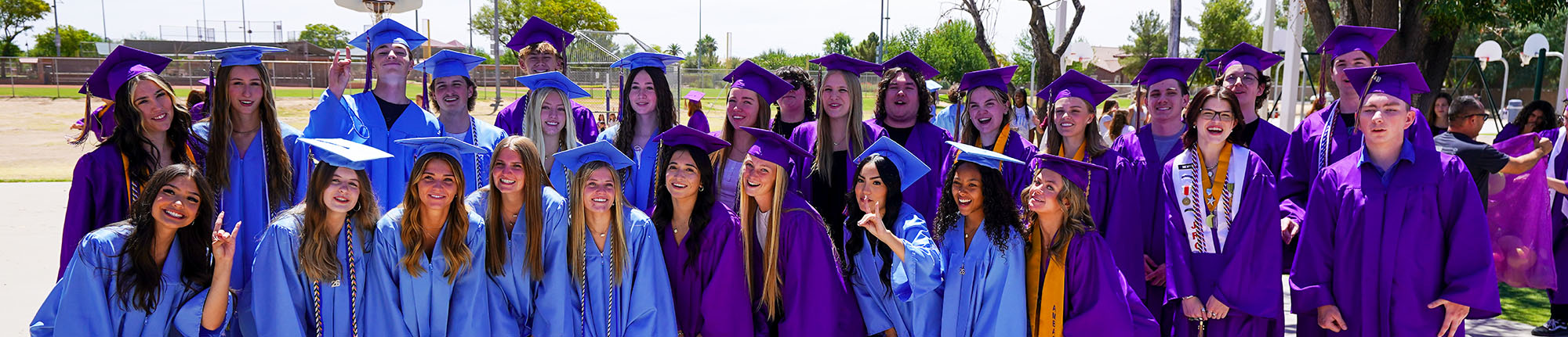 Group of happy high school graduates