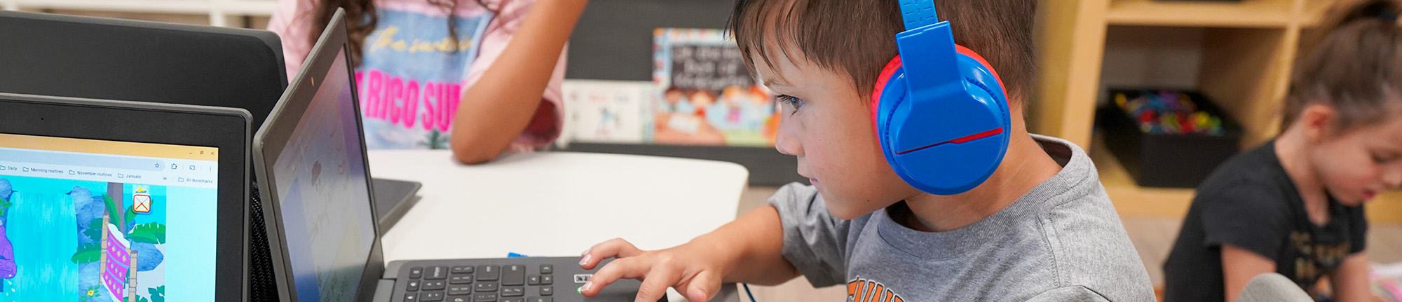 Elementary student learning on a laptop computer