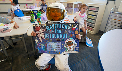 Katherine Mecham Barney Elementary student dressed as an astronaut during the annual Everyone Has Genius Day