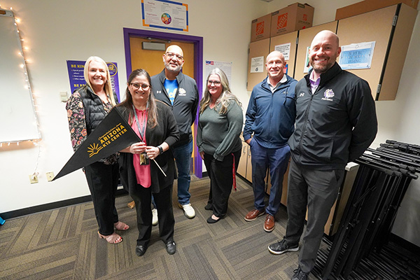 Elizabeth Reynolds and staff members