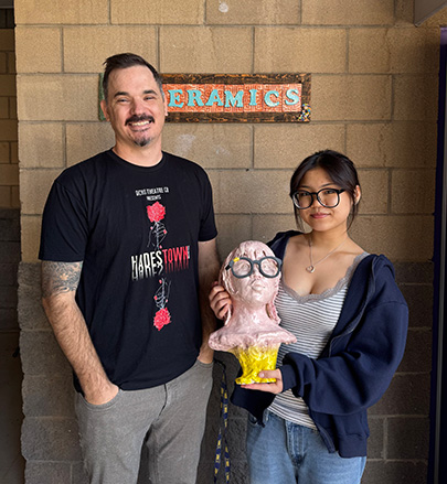 QCHS senior Aris Joung with her ceramics teacher, Mr. Davis