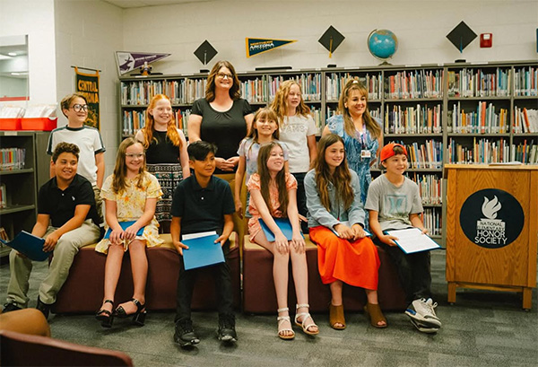 Smiling students in the library