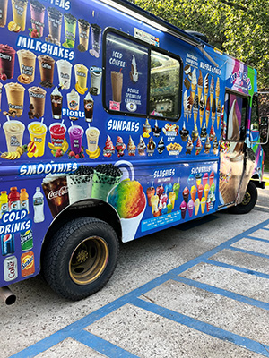 Blue dessert truck at the end-of-the-year picnic