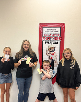 Group of happy students with awards