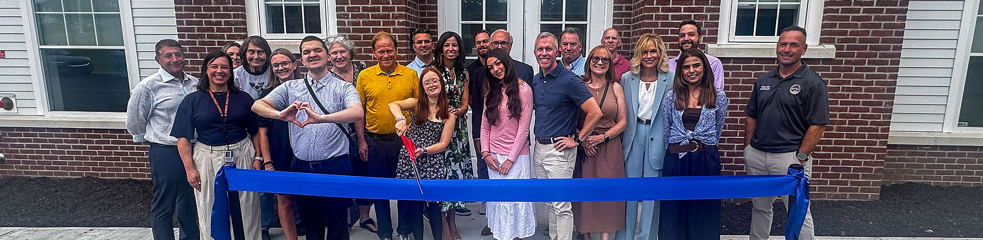 New school ribbon cutting group photo