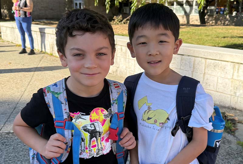 Two students outside of school