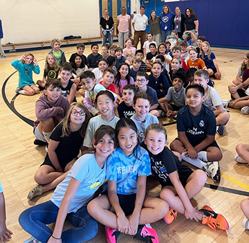 Group of happy students in the gym
