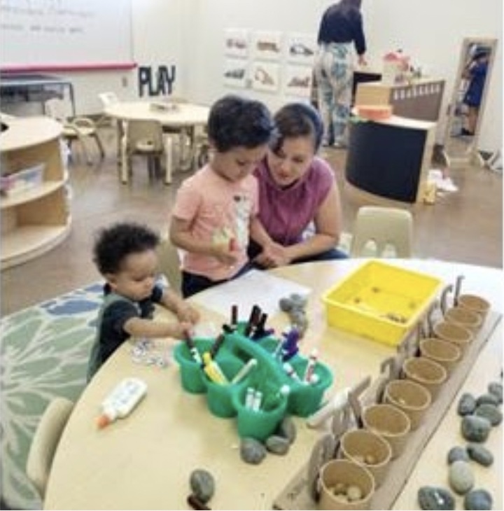 adult and kids drawing
