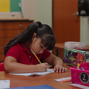 girl working on worksheet