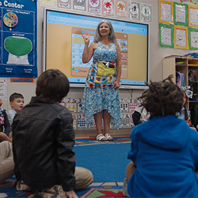 student engaged with teacher