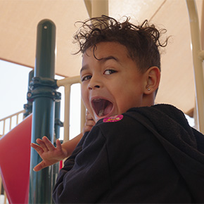 boy playing on playground