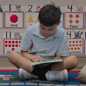 boy working to learn numbers