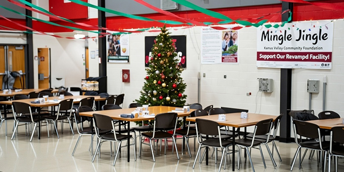 School cafeteria decorated for a Mingle Jingle event