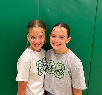 two students in SS Wildcats t-shirts