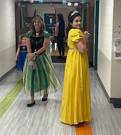 Staff member dressed as princesses