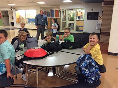 Mr. Ledebur, School Counselor, greets students the first day of school. Mr. Ledebur, School Counselor, greets students the first day of school.