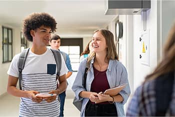 Two students walking together