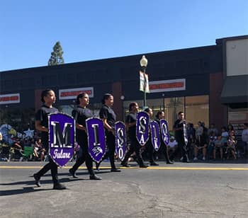 Students marching in a parade