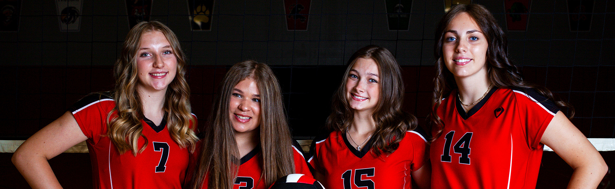 Four volleyball players