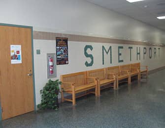 school hallway with a sign that reads Smethport