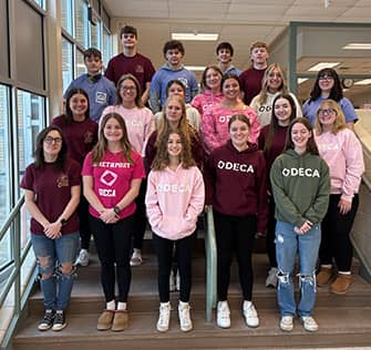 Students in DECA shirts