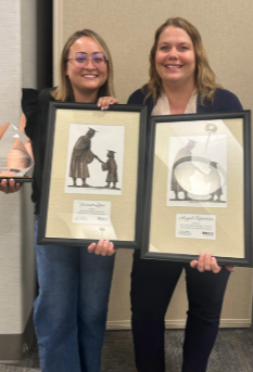Yesenia and Angela holding there awards