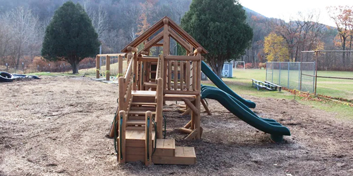 New playground at Hawlemont Regional School includes slides, swings and multiple structures for children to climb.