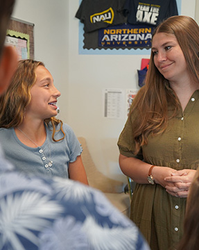 Teacher talking with a student