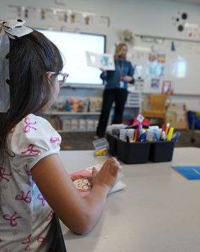 Student engaged in learning in the classroom