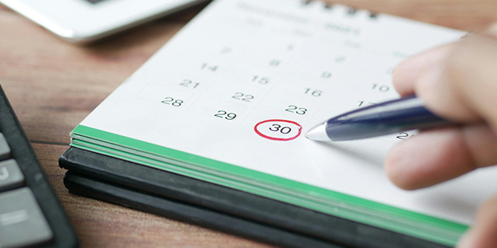 Desk calendar with 30 circled in red