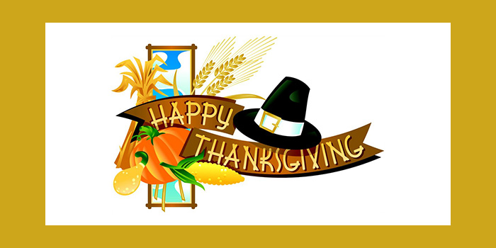 Happy Thanksgiving with a pilgrim's hat and fall crops