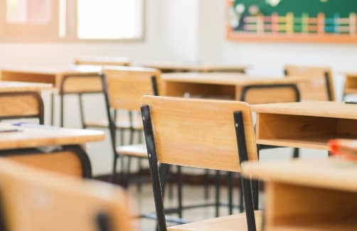 desks lined up in a classroom