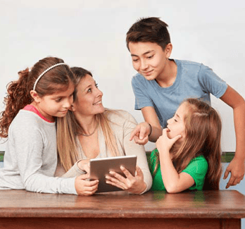 teacher and students with tablet