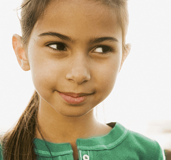 Hispanic girl in green shirt