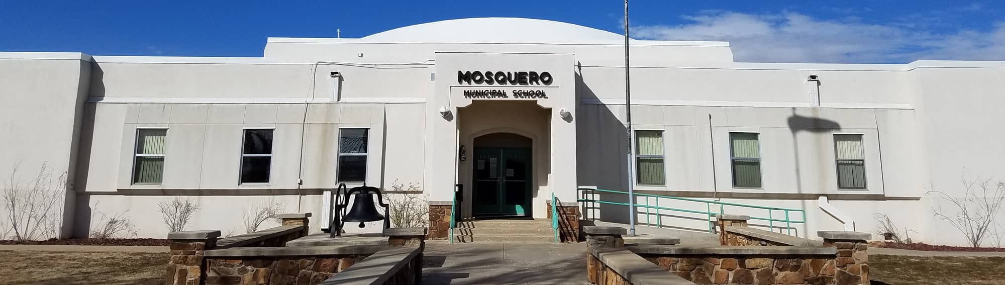 headerphoto_060920 Front of the Mosquero Municipal School building
