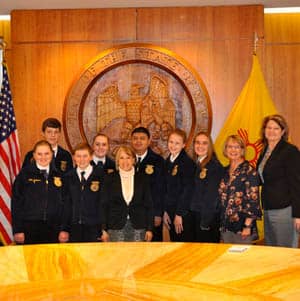 Group of students and staff members posing together