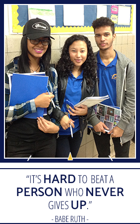 Three students in hallway and "It's hard to beat a person who never gives up." - Babe Ruth quote