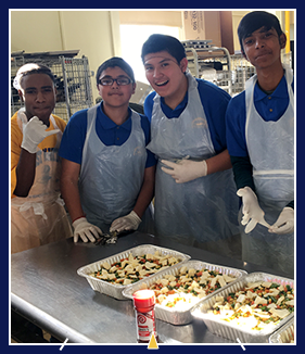 Students in the kitchen preparing food