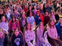 Students at the play "Mesmerized"