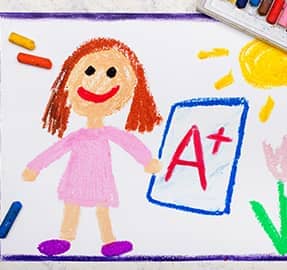 Drawing of a happy school girl next to an A+ grade