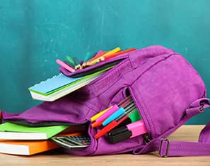 backpack with school supplies in it
