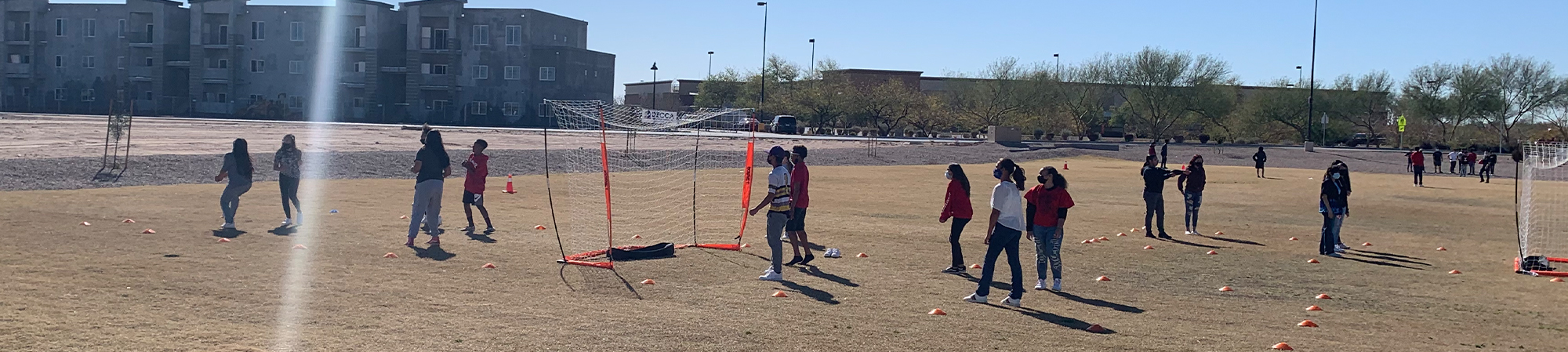 Students playing soccer