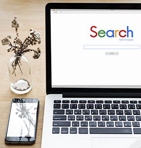 laptop with search on screen